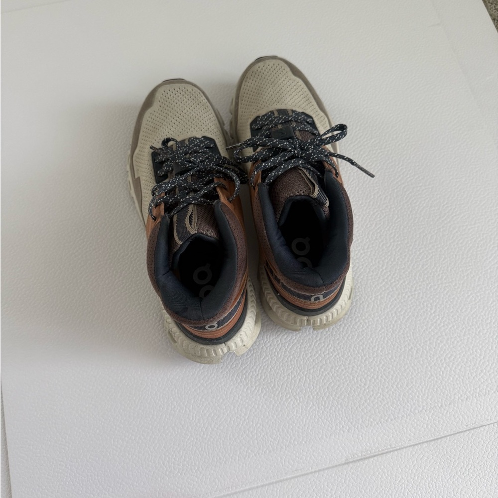 On Running Women's Beige and Brown Trail Sneakers with Black Accents